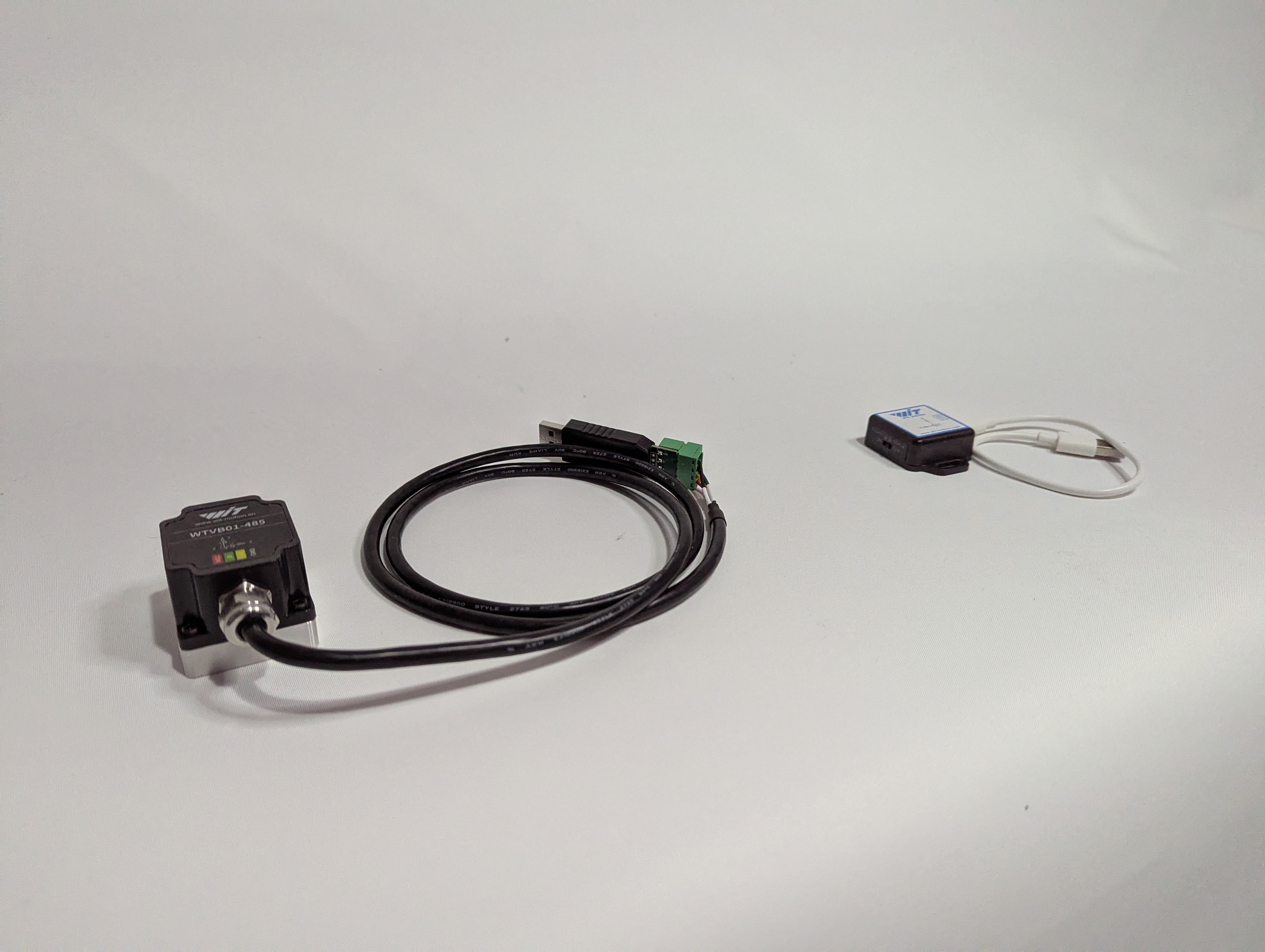 A vibration sensor (left) and an accelerometer (right).